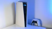 PlayStation 5 in corner with blue backlight