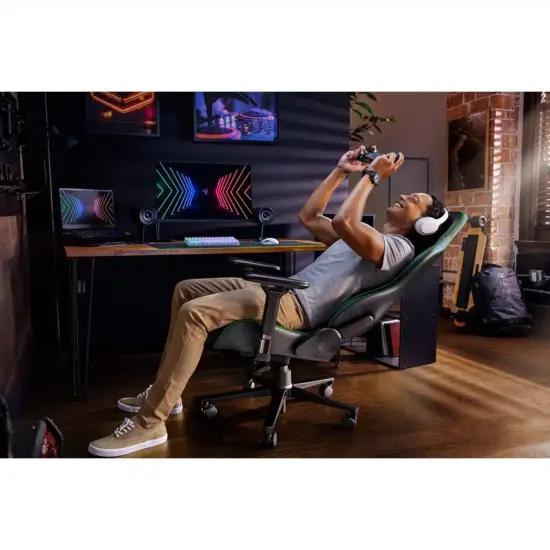 Razer - Enki Gaming Chair - Black & Green - Reclined Side View With Person